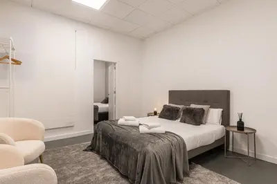 Cama o camas de una habitación en Waou Essence I Los Austrias - Corta Duración