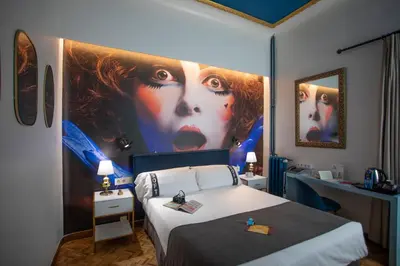 Cama o camas de una habitación en Casual del Teatro Madrid
