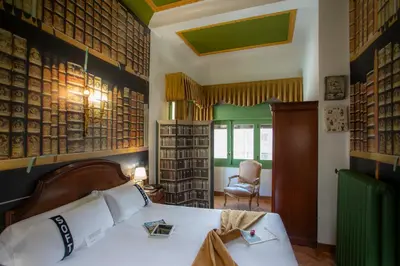 Cama o camas de una habitación en Casual del Teatro Madrid