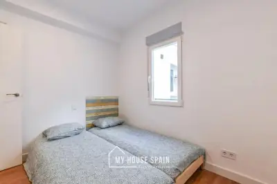Cama o camas de una habitación en MyHouseSpain - Moderno piso en Embajadores