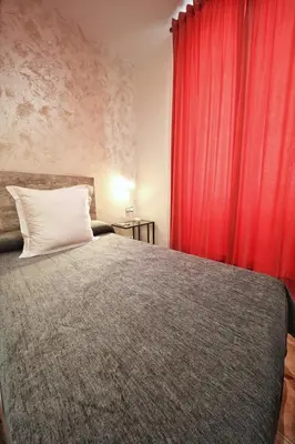 Cama o camas de una habitación en Hostal Las Fuentes