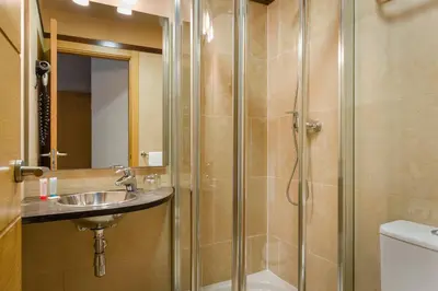 Un baño de Windsor Puerta del Sol