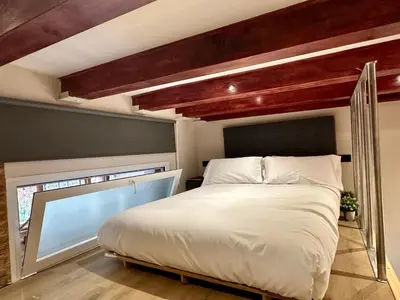 Cama o camas de una habitación en PACOROOMS