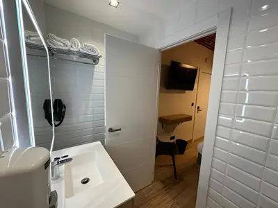 Un baño de PACOROOMS