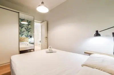 Cama o camas de una habitación en Acogedor piso Madrid Centro ALQUILER TEMPORAL
