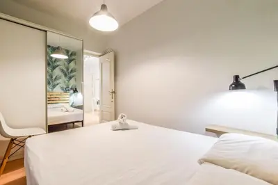 Cama o camas de una habitación en Acogedor piso Madrid Centro ALQUILER TEMPORAL