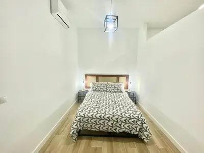 Cama o camas de una habitación en Puente Praga Aparment