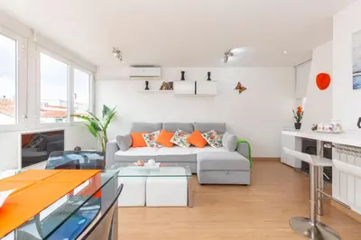 Zona de estar de Apartamento Ático Las letras - Alojamiento de temporada