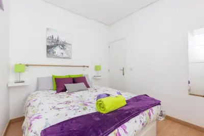 Cama o camas de una habitación en Apartamento Ático Las letras - Alojamiento de temporada