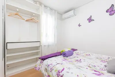 Cama o camas de una habitación en Apartamento Ático Las letras - Alojamiento de temporada
