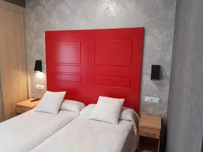 Cama o camas de una habitación en Hostal Avenida