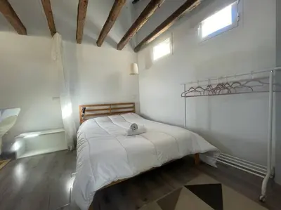 Cama o camas de una habitación en Punta Me Beautiful Apartment in Plaza España