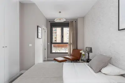 Cama o camas de una habitación en Victor Apartments Retiro Park