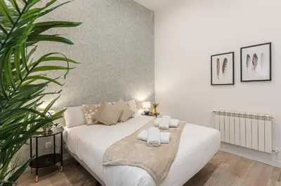 Cama o camas de una habitación en Waou Ponzano & Chamberi II