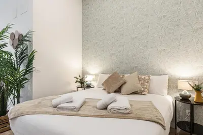 Cama o camas de una habitación en Waou Ponzano & Chamberi II