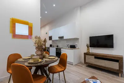Una televisión o centro de entretenimiento en Waou Ponzano & Chamberi IV
