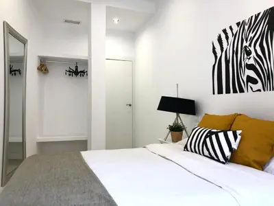 Cama o camas de una habitación en Apartamento de Diseño en Plaza Mayor