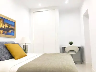 Cama o camas de una habitación en Apartamento de Diseño en Plaza Mayor