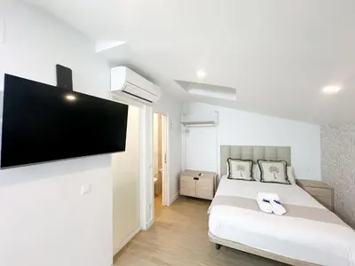 Cama o camas de una habitación en Apartamento Andrés Tamayo AV AMERICA