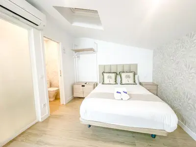 Cama o camas de una habitación en Apartamento Andrés Tamayo AV AMERICA