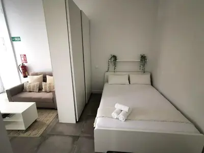 Cama o camas de una habitación en Apartamento Andrés Tamayo AV AMERICA