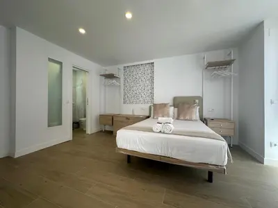 Cama o camas de una habitación en Apartamento Andrés Tamayo AV AMERICA