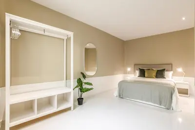 Cama o camas de una habitación en Apartamento Embajadores X