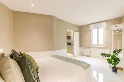 Cama o camas de una habitación en Apartamento Embajadores X