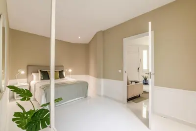 Cama o camas de una habitación en Apartamento Embajadores X