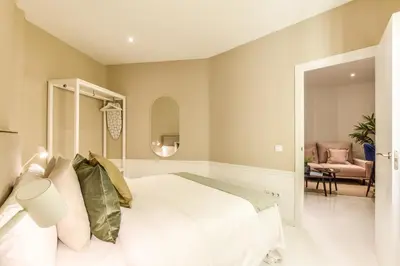 Cama o camas de una habitación en Apartamento Embajadores X