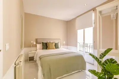 Cama o camas de una habitación en Apartamento Embajadores XI