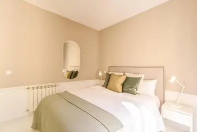 Cama o camas de una habitación en Apartamento Embajadores XI