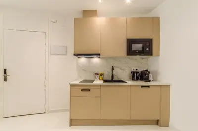 Una cocina o zona de cocina en Apartamento Embajadores XI