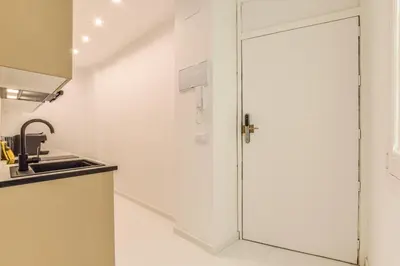 Una cocina o zona de cocina en Apartamento Embajadores XII