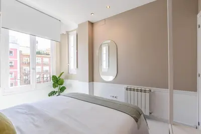 Cama o camas de una habitación en Apartamento Embajadores XII