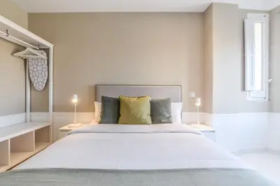 Cama o camas de una habitación en Apartamento Embajadores XIII