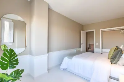 Cama o camas de una habitación en Apartamento Embajadores XIII