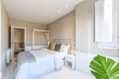 Cama o camas de una habitación en Apartamento Embajadores XIII