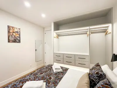 Cama o camas de una habitación en Piso elegante Atocha 2H/2B by Berlany España