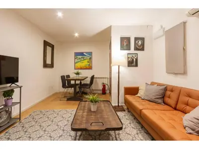 Una televisión o centro de entretenimiento en Bonito apartamento en B. Salamanca H34