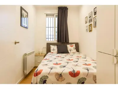 Cama o camas de una habitación en Bonito apartamento en B. Salamanca H34