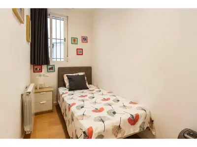 Cama o camas de una habitación en Bonito apartamento en B. Salamanca H34
