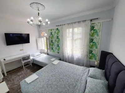 Cama o camas de una habitación en N1 Casa de Madrid - greenpeace line