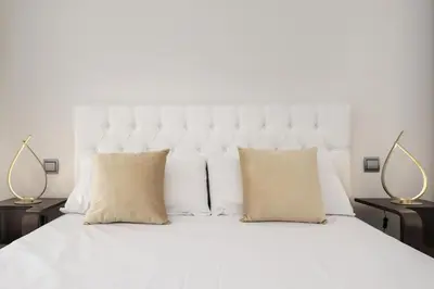 Cama o camas de una habitación en Luxury apartments in Barrio Palacio
