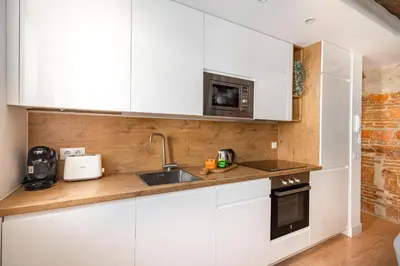 Una cocina o zona de cocina en Chueca II calle Barco 2BR 2BH