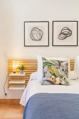 Cama o camas de una habitación en Luminoso y tranquilo cerca de Gran Vía