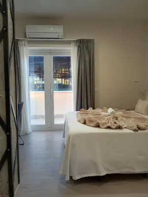 Cama o camas de una habitación en HOSTAL LA ESTACION TERRAZAS