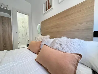 Cama o camas de una habitación en Encantador Tirso Molina Exterior Mesón Temporal