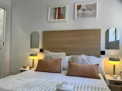 Cama o camas de una habitación en Encantador Tirso Molina Exterior Mesón Temporal