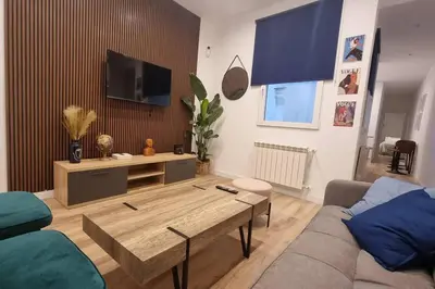 Una televisión o centro de entretenimiento en Apartamento en pleno centro